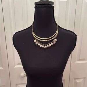 Elegant Gold Tone and Cream Bib Necklace with Pearl Like Accents